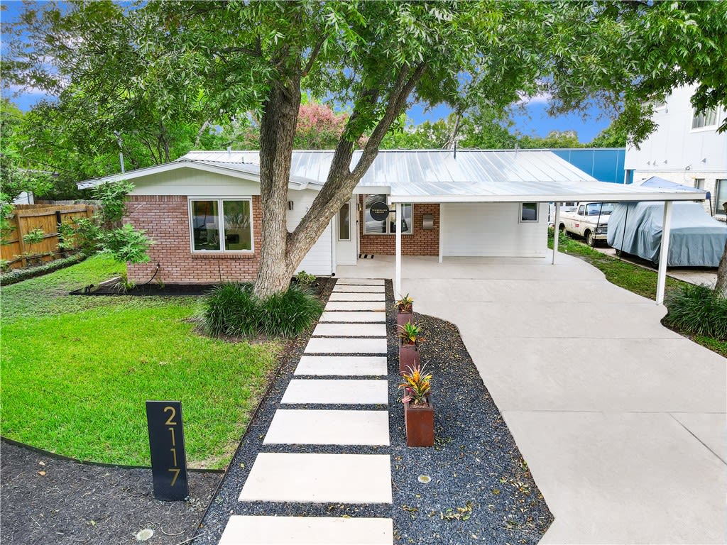 Joe & Cara Keenan with Michelle Kopp Austin Real Estate Agents & Luxury Realtors