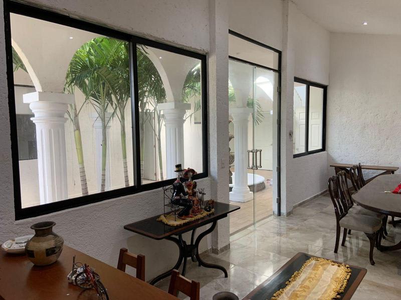 House Can-Can, a captivating residence nestled within the prestigious Cancun Country Club