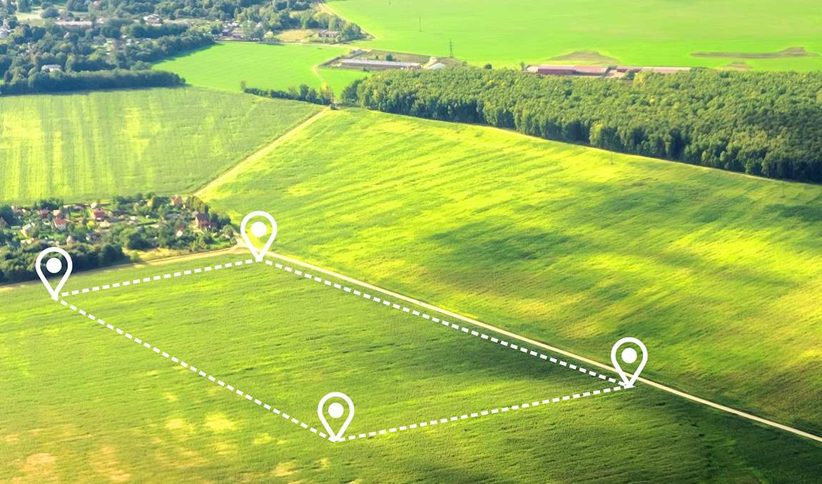 Aerial view of green field, position point and boundary line to show location and area. A tract of land for owned, sale, development, rent, buy or investment