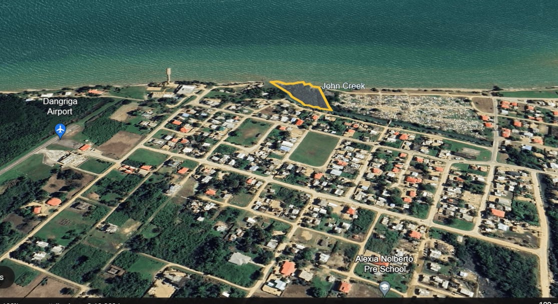 Charming 1.6 acre Caribbean Beachfront peninsular in Dangriga Town, Belize