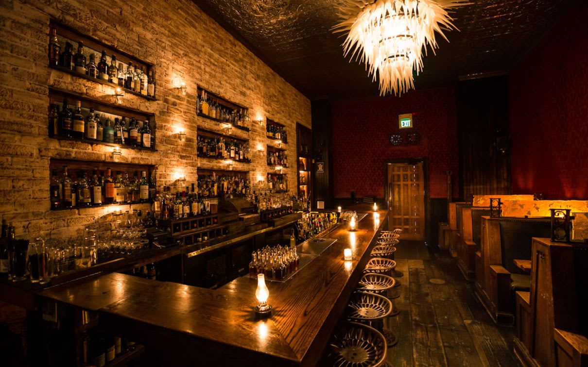 Uncover a hidden gem in San Francisco's vibrant Lower Nob Hill district – Bourbon & Branch, a clandestine speakeasy experience. This historic bar, operating since the 1920s, transports you to the Prohibition era with handcrafted cocktails, secret entrances, and an air of mystery. Reservations and a password are required to enter – are you ready for a night to remember?