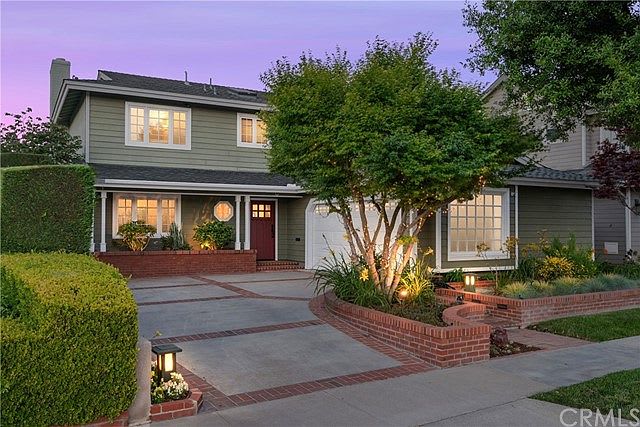 Exterior of home in Seal Beach CA with tree 