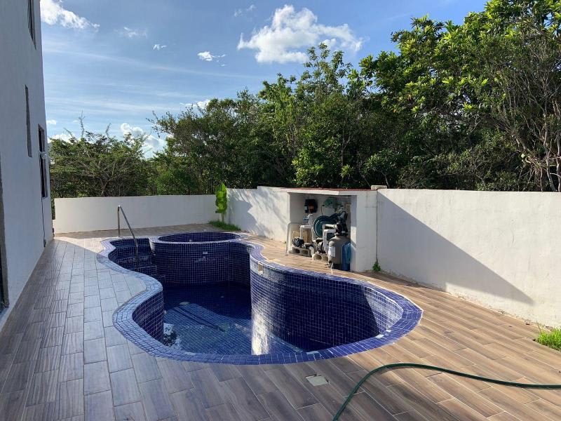 House Can-Can, a captivating residence nestled within the prestigious Cancun Country Club/ Pool