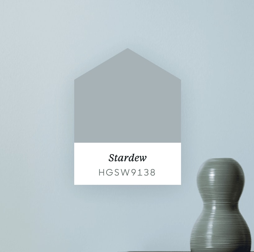 Stardew HGSW9138 paint color swatch beside a gray ceramic vase.