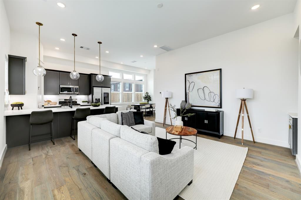 large living room with a gray couch 