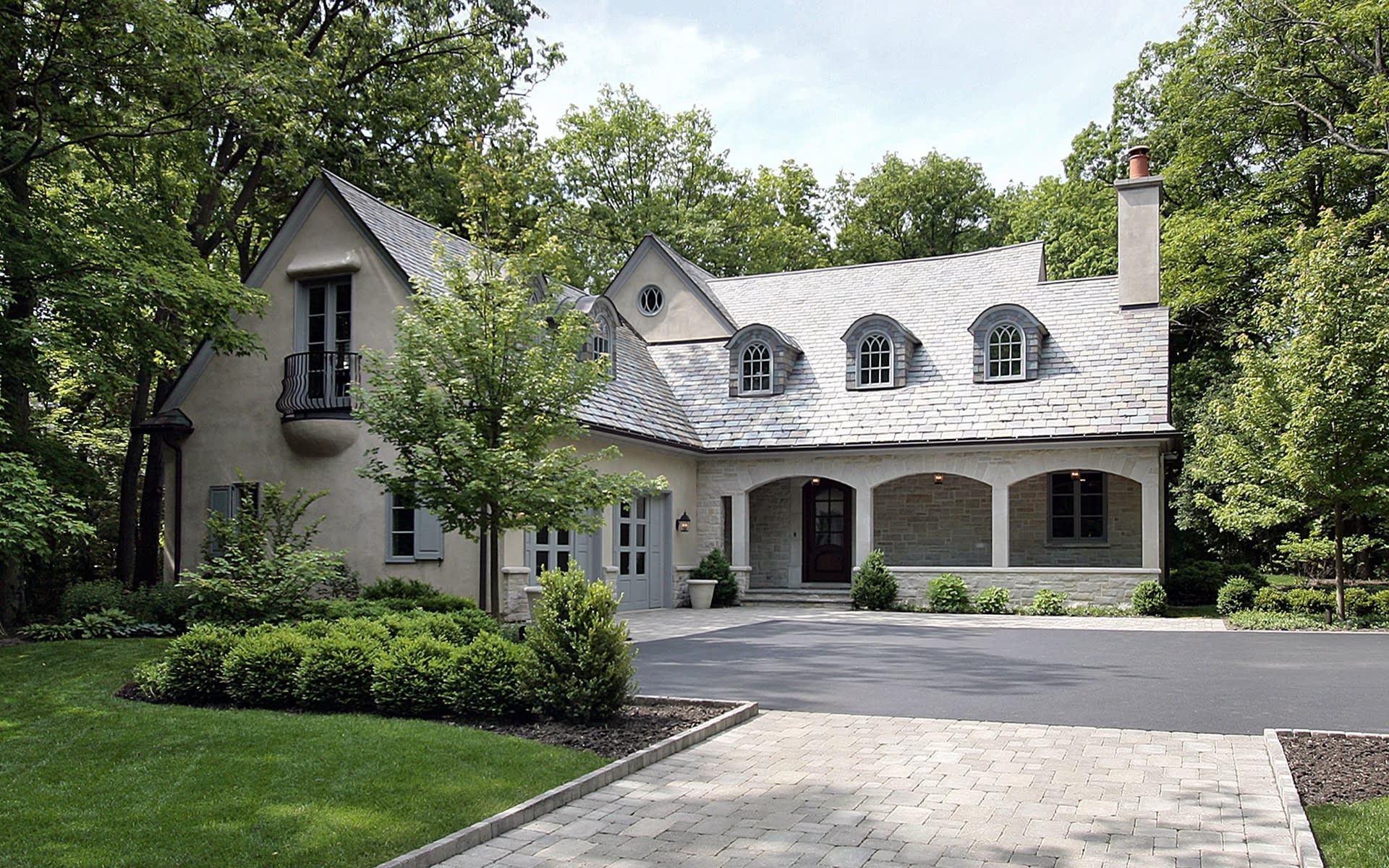 Exterior landscaping of residential home representing property inspection and due diligence