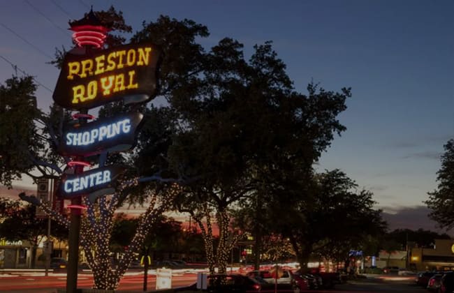 A neon sign for a shopping center in Preston Royal Shopping Center in Preston Hollow Dallas