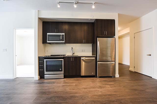 Spacious 1 bedroom + den condo in uptown core