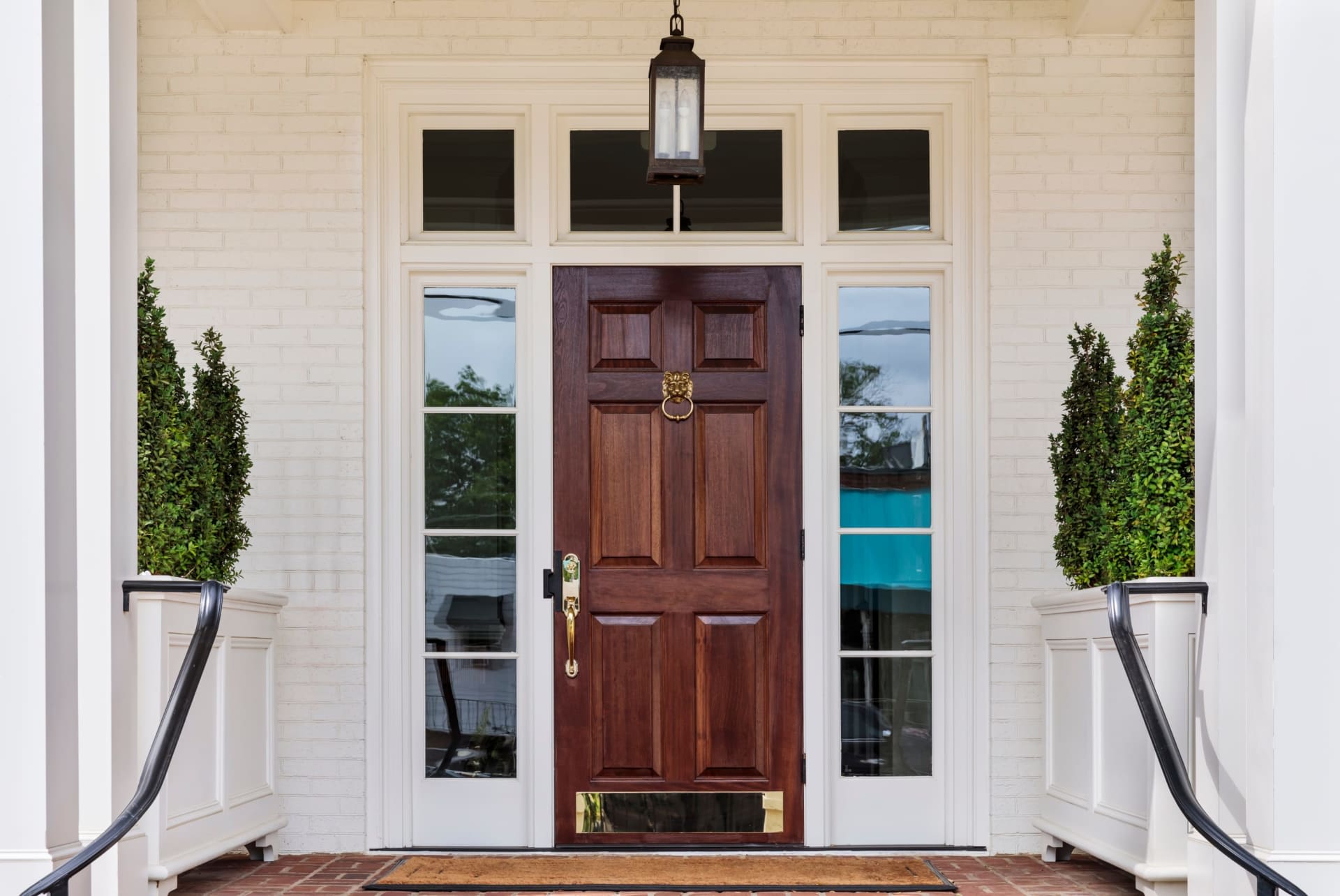 Classic elegant front door entryway signifying successful deed recording and home sale closing in Turlock CA