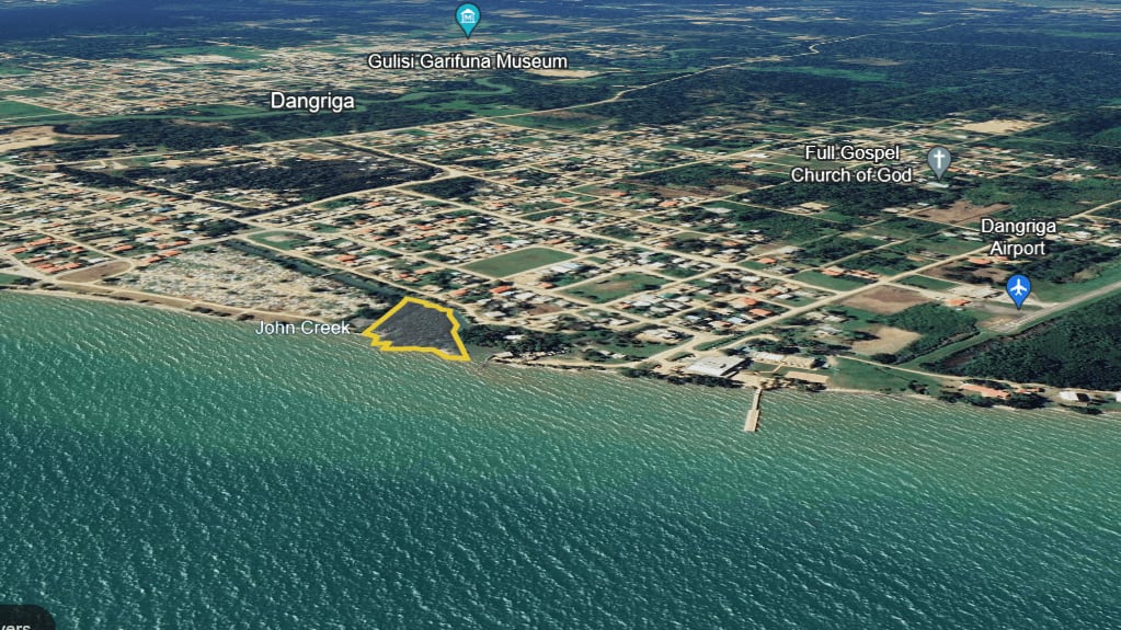 Charming 1.6 acre Caribbean Beachfront peninsular in Dangriga Town, Belize