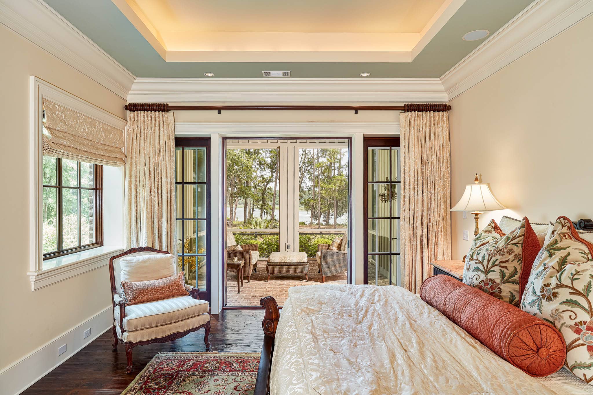 Bedroom with covered porch attachment