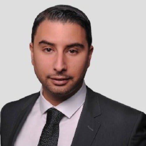Headshot of First Team agent Michael Sayegh