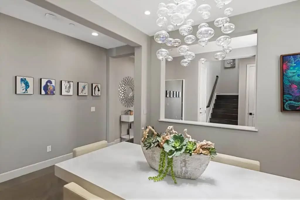 Airbnb rental dining area with welcome binder