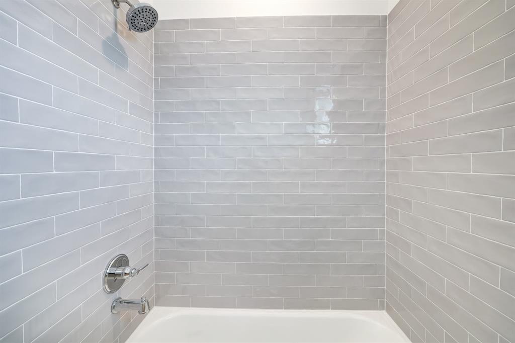 tiled shower in a bathroom 