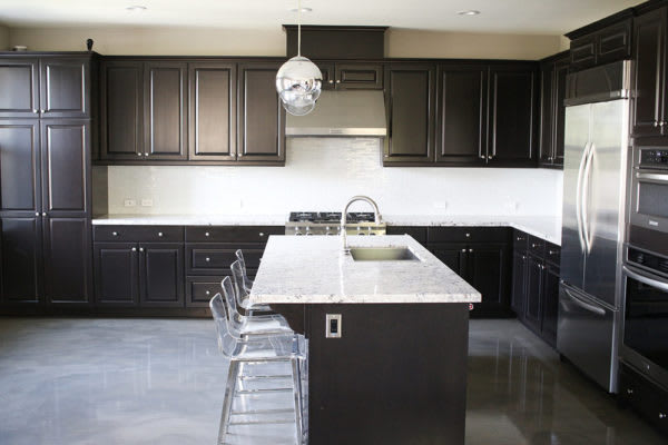 Close-up of traditional cabinet knobs before update