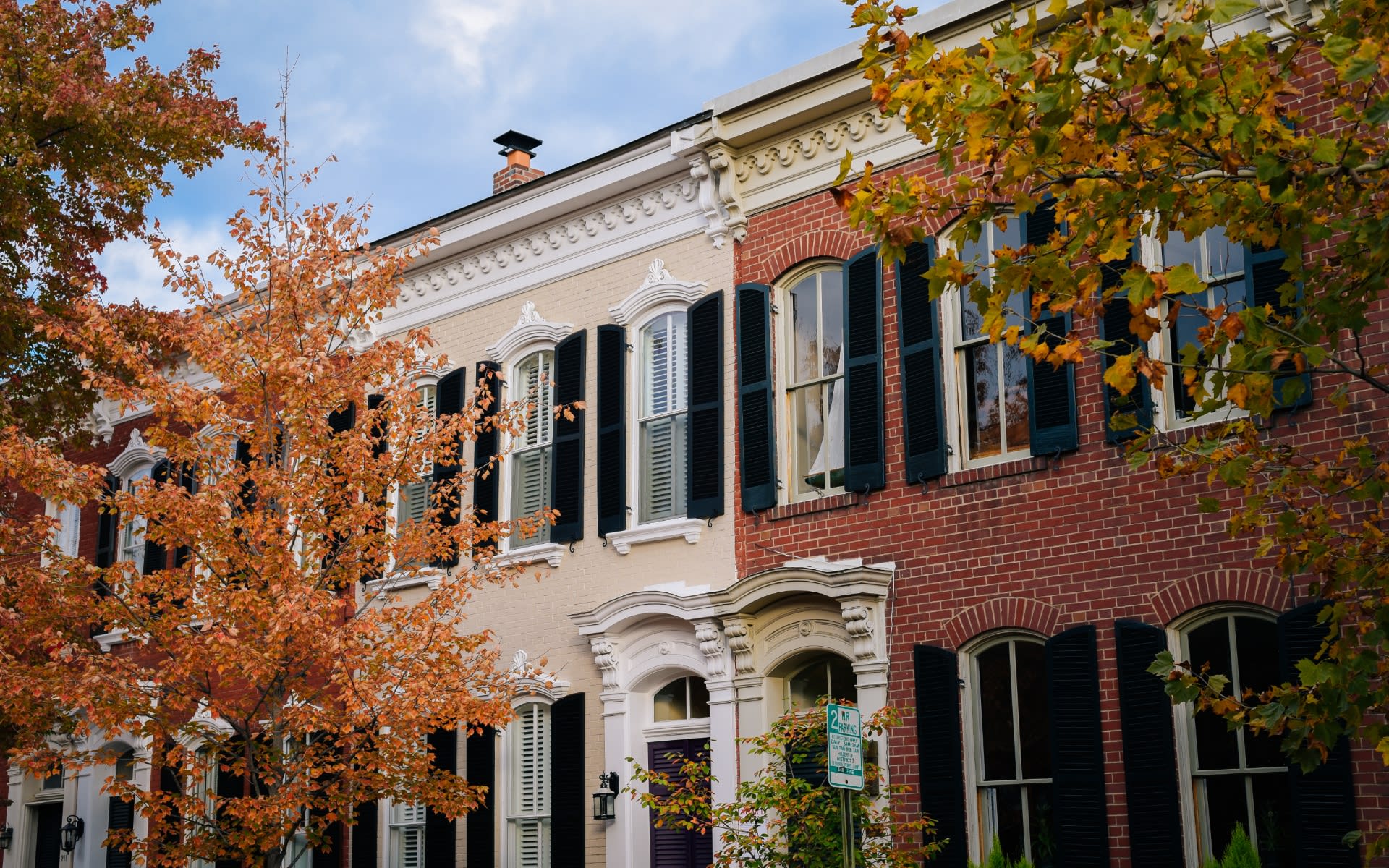 A charming brick exterior with ample windows.