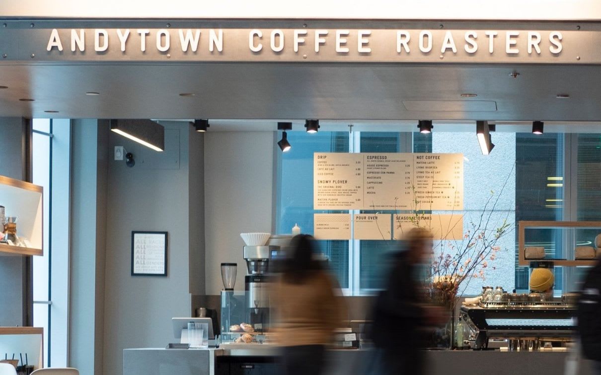 Patrons drawn to the menu board at Andytown Coffee Roasters on 181 Fremmont