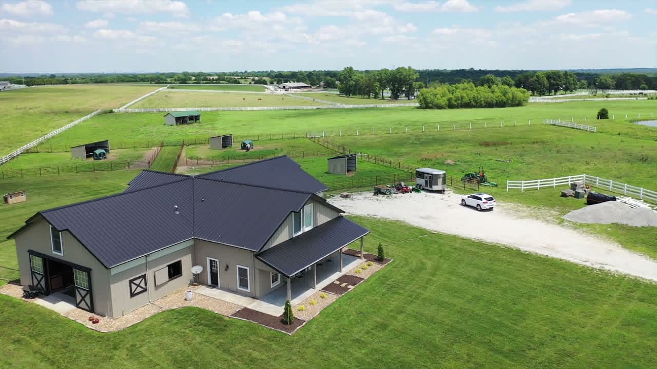 Beautiful 10 acre horse property with custom 6 stall barn with apartmeent in Olathe, KS!