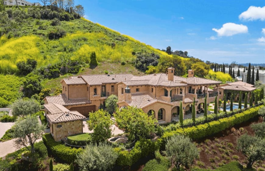 Stunning, large San Juan Capistrano estate in lush surroundings with backyard pool and views.