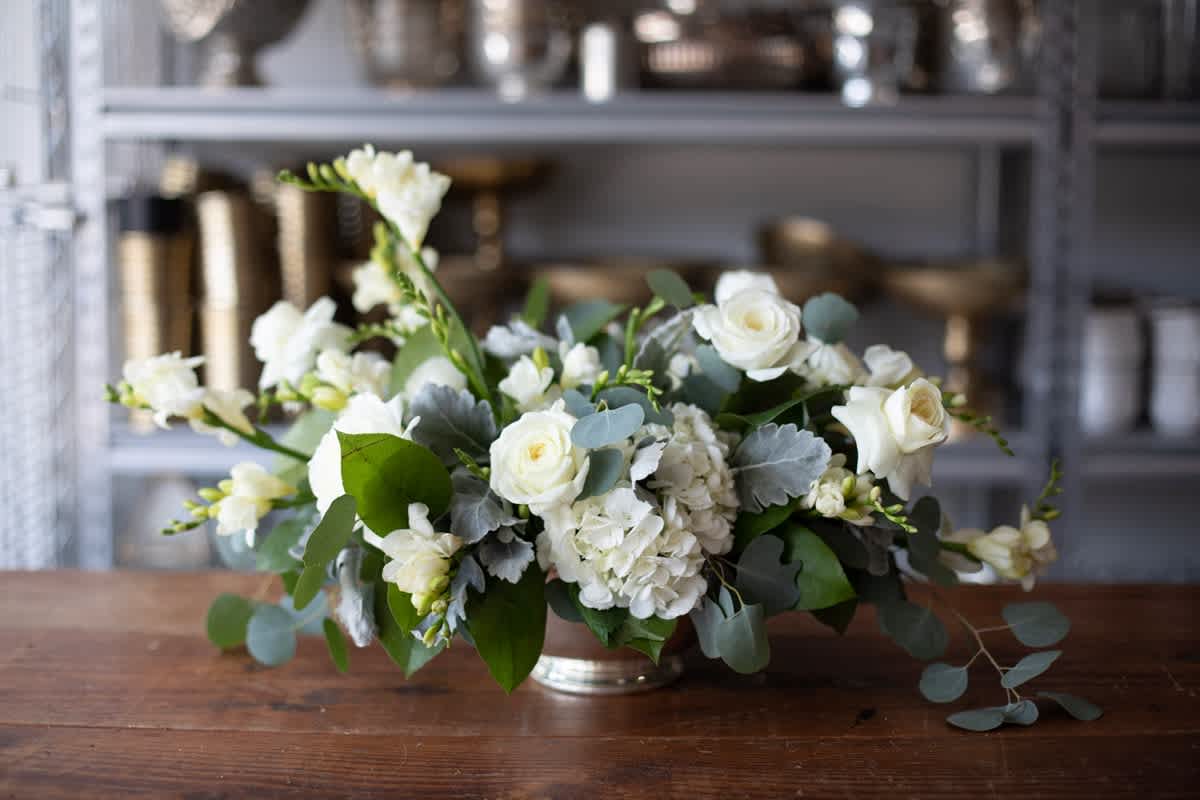 nest realty winter floral arrangement