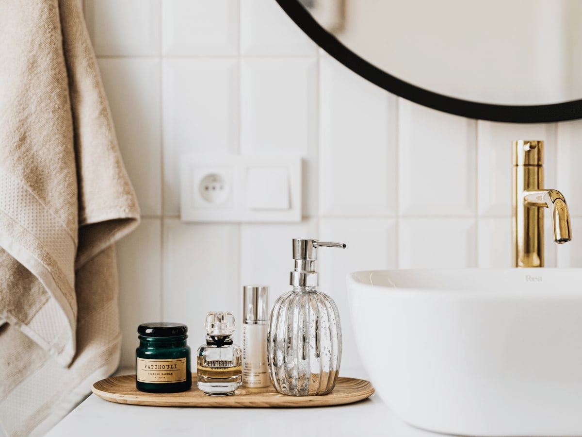 Bathroom counter top showing personal items