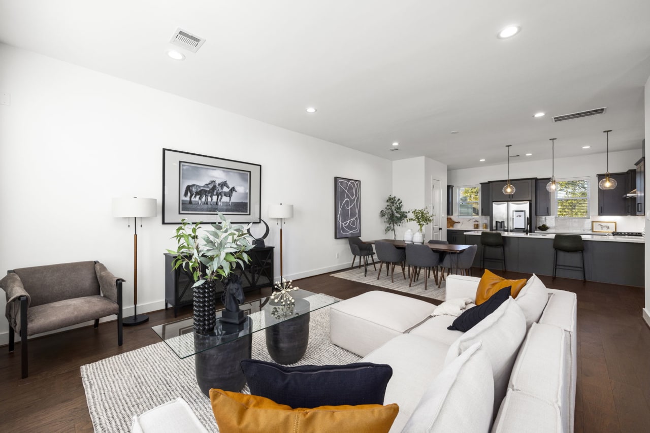 model living room with gold accent pillows 