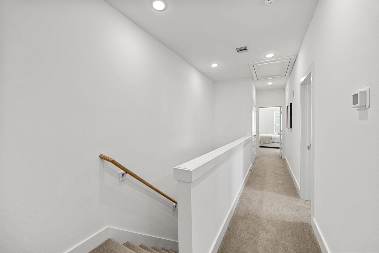 hallway and stairway in a new townhome