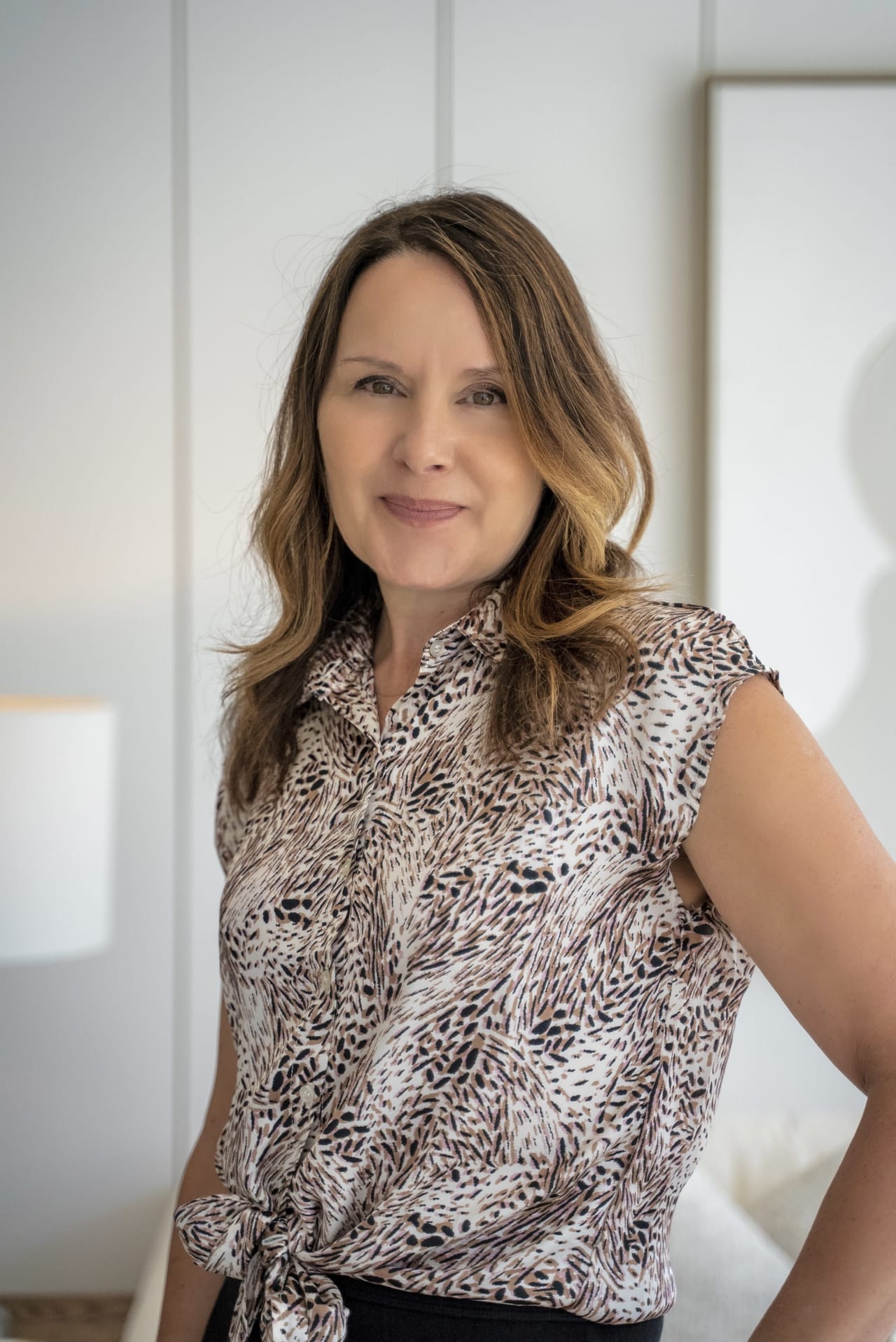 Sheila Shabsove standing in the Grace & Co. office