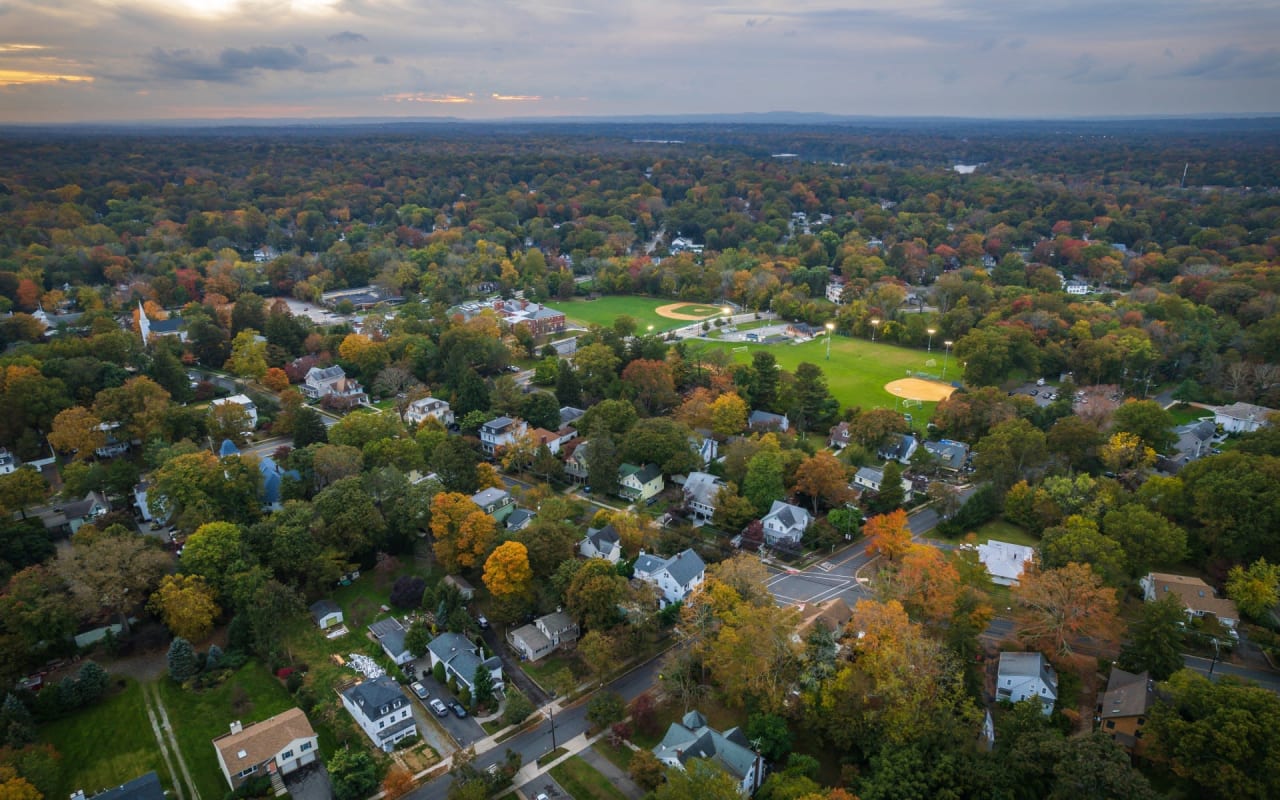 An aerial view of a residential neighborhood in the fall 