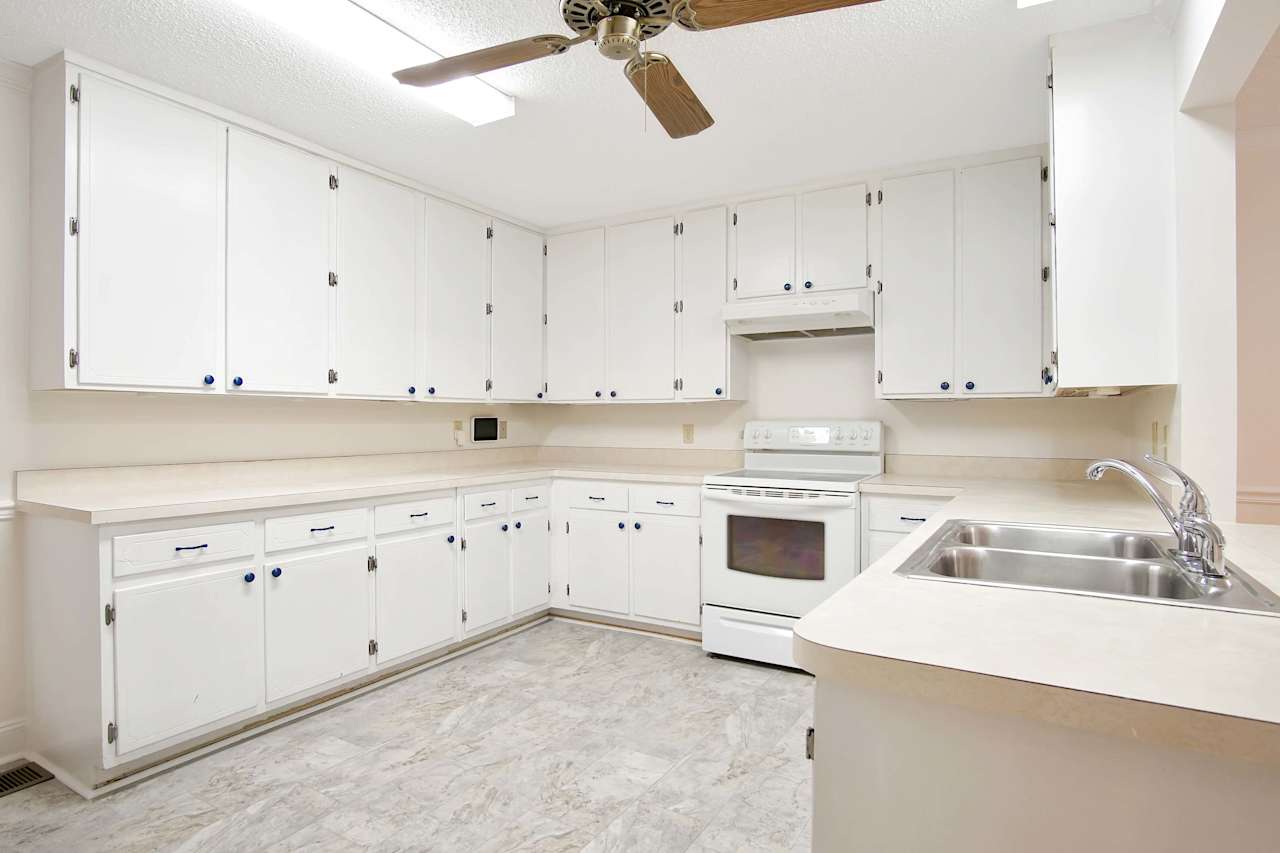 Photo of the kitchen featuring dual light fixtures