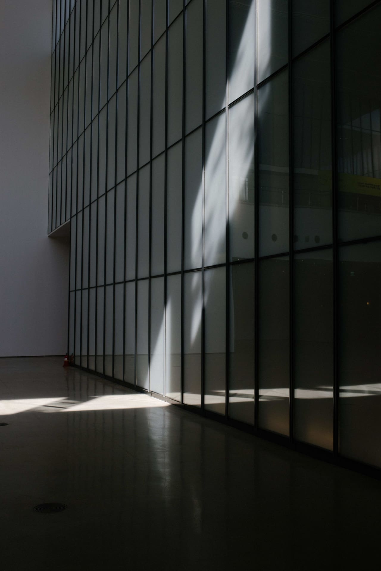 a sunlit hallway in a modern building