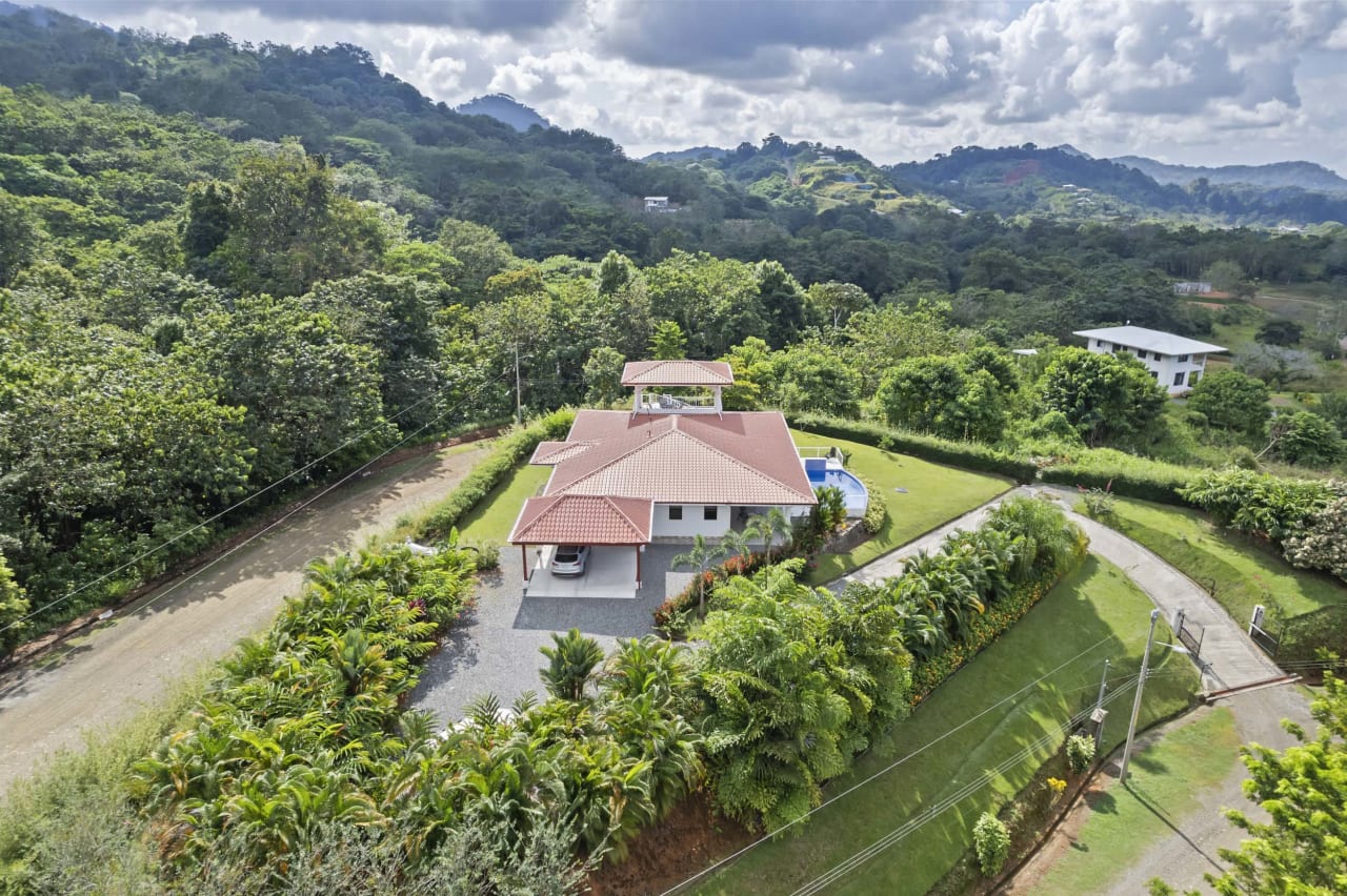 Luxurious 4-Bedroom Home With Family-Friendly Layout, Incredible Pacific Ocean Views & Lush Tropical Grounds In Ojochal Costa Rica