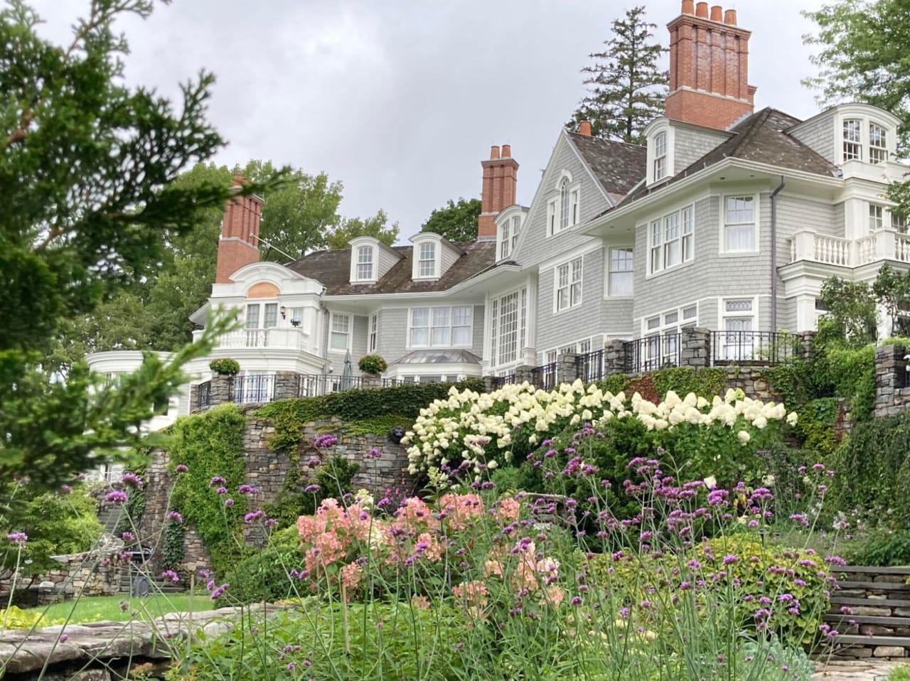 Two homes of Stockbridge philanthropists on the same street are now for sale - and a world apart