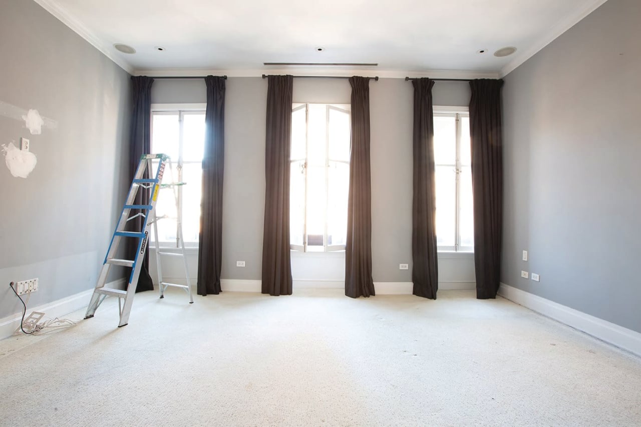 empty bedroom with ladder