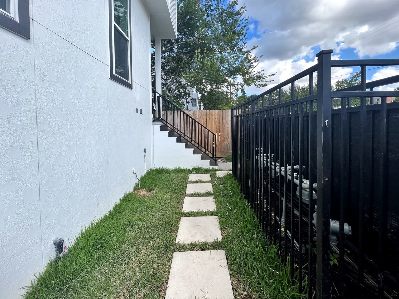 side walkway in a new home by Oracle City Homes