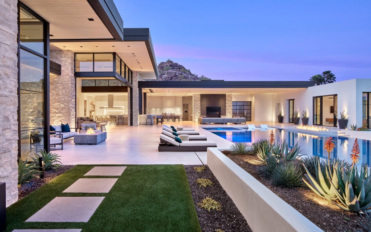 Luxury modern estate with indoor outdoor living and mountain views