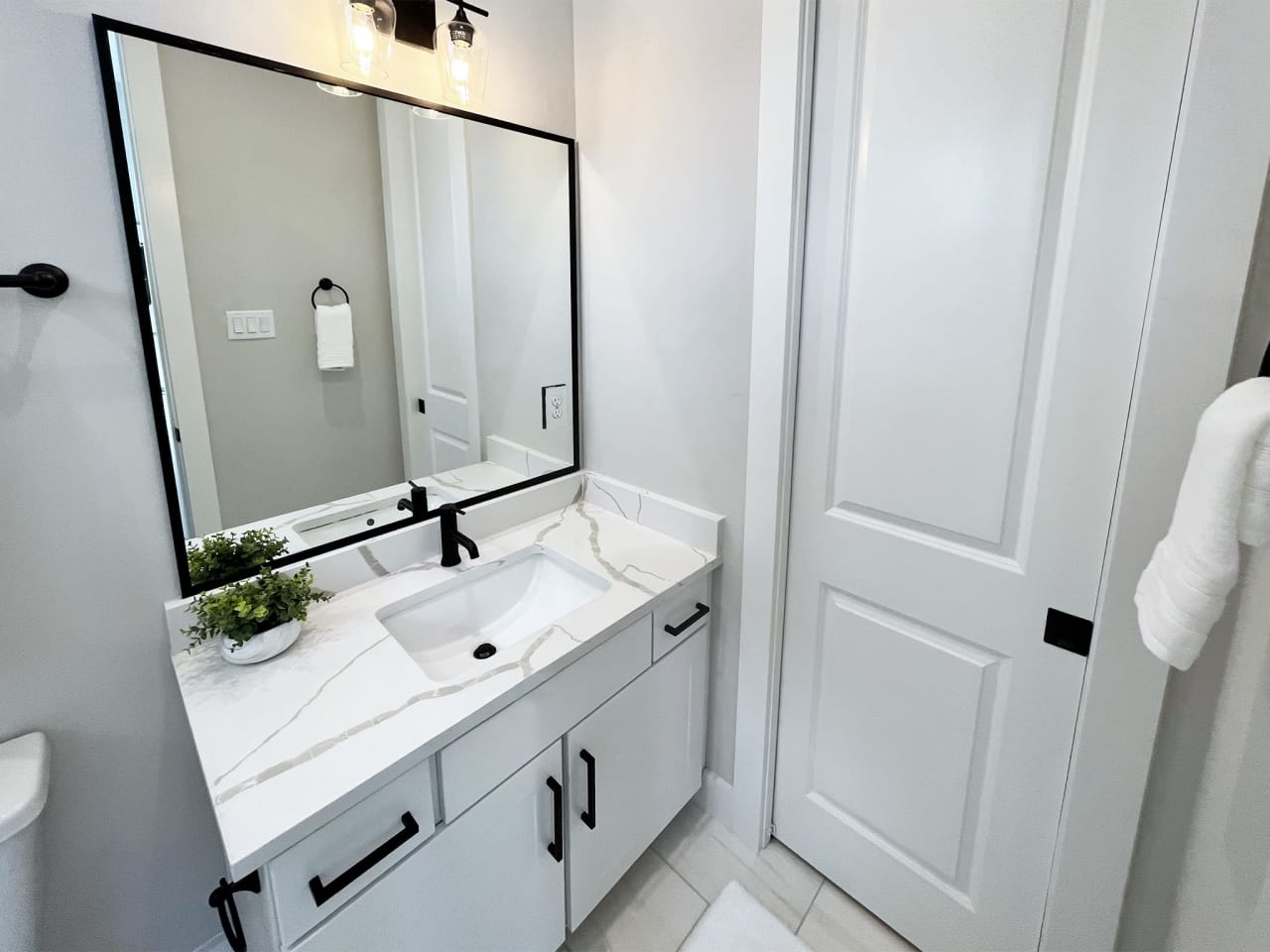 bathroom with a white vanity 