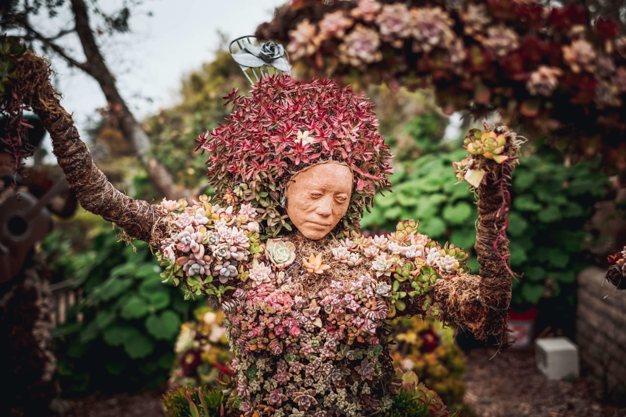 San Diego Botanic gardens scultpure of woman made of succulents