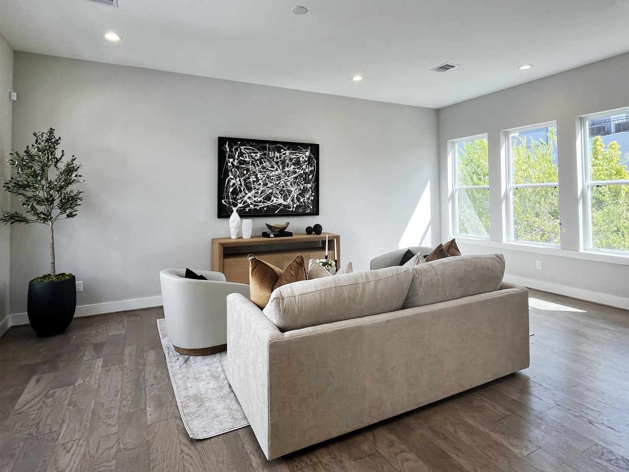 living room with a large gray couch 