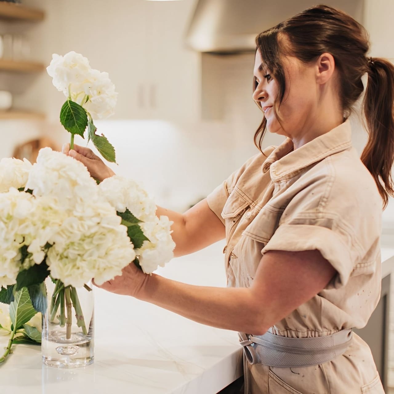 real estate agent staging with flowers 