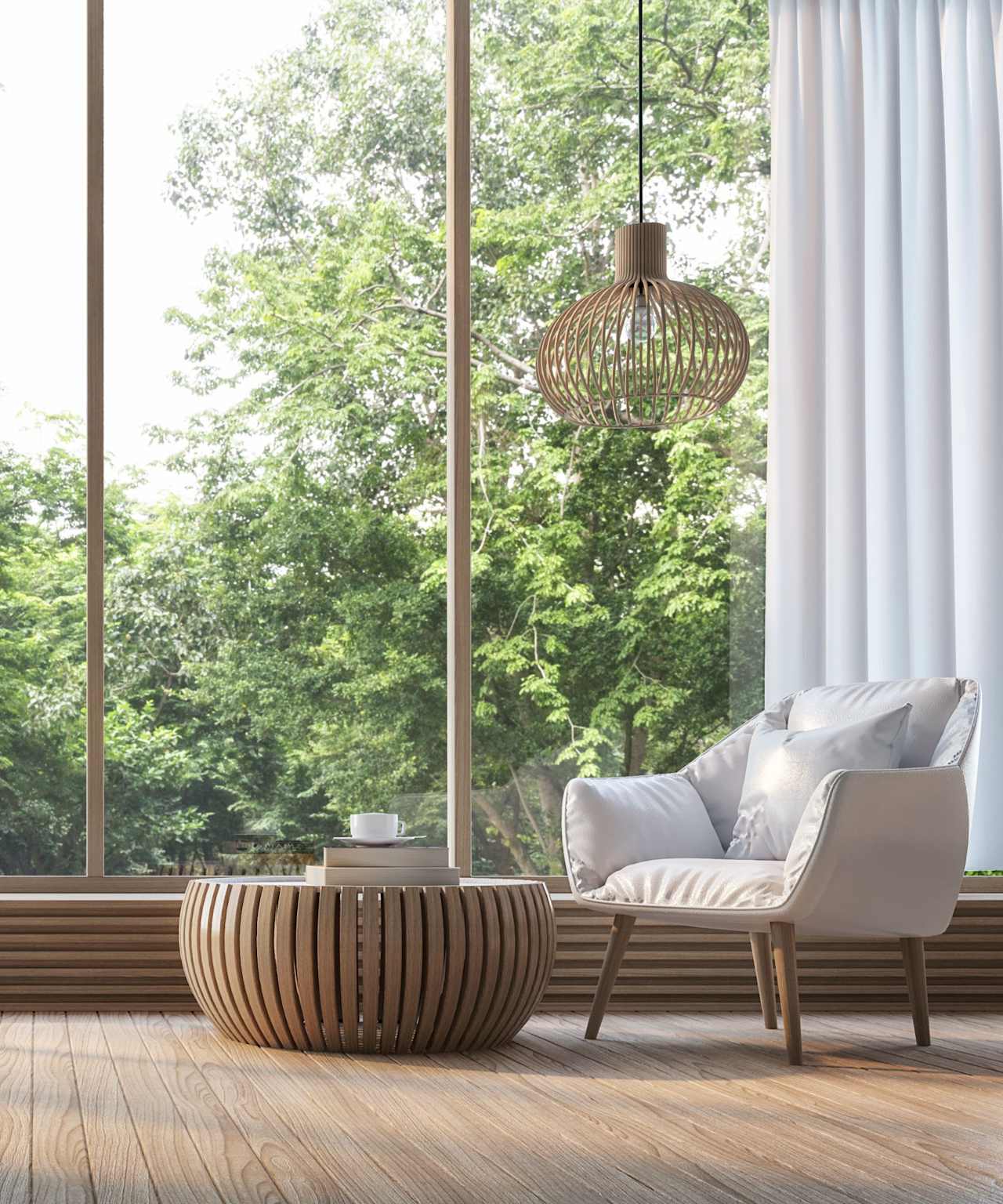 A sunlit living room with a comfy armchair and a round coffee table