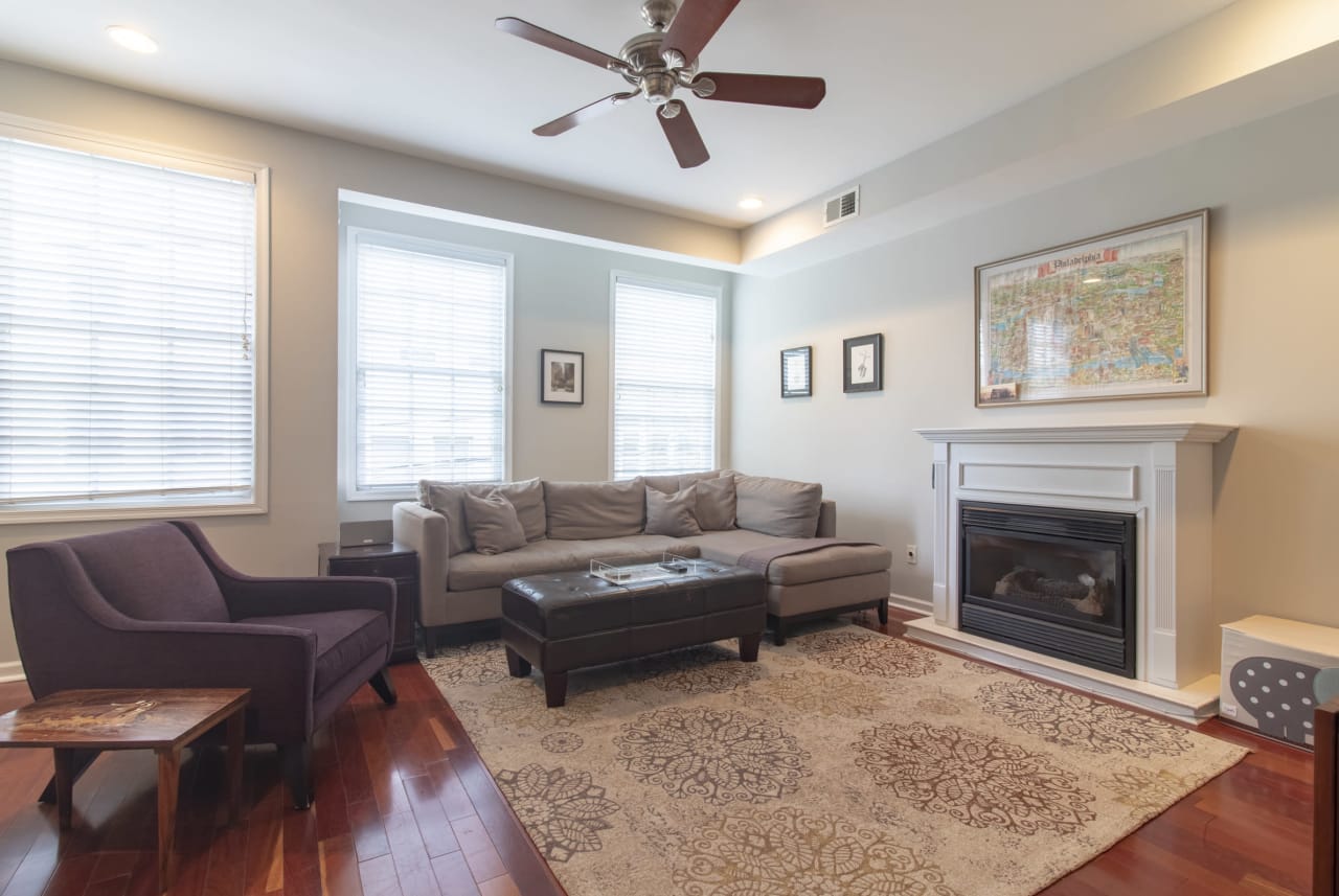 living room with map and couches