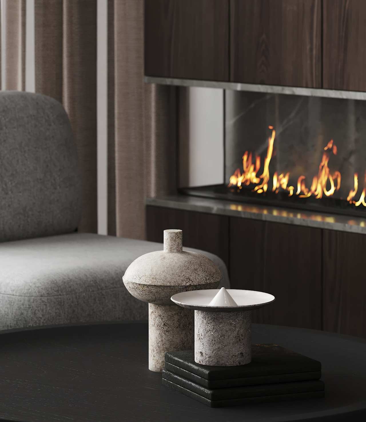 Modern living room with a linear fireplace, gray chair, and sculptural stone decor on a coffee table.