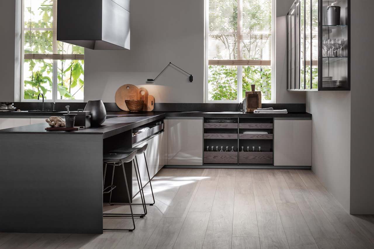 A modern kitchen with a stainless steel countertop