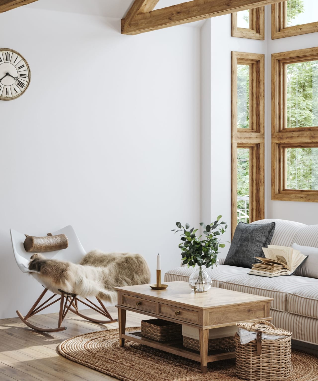 A cozy living room with a brown couch, a wooden rocking chair, a rectangular coffee table, and a patterned rug