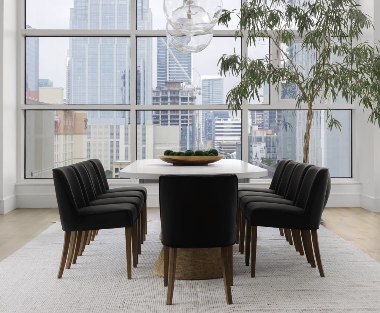 dining table in a dining room with black chairs I elite austin