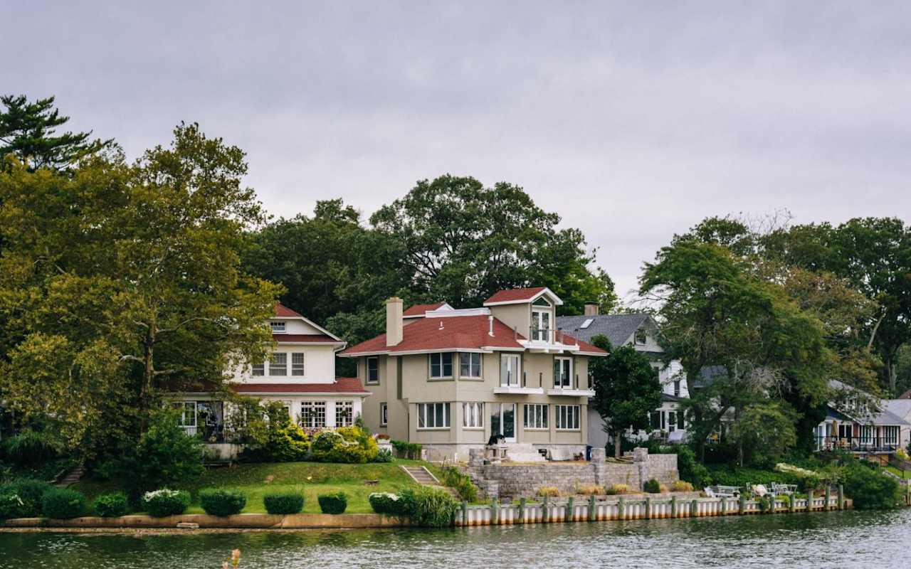 Lakeside Mansion Surrounded by Trees