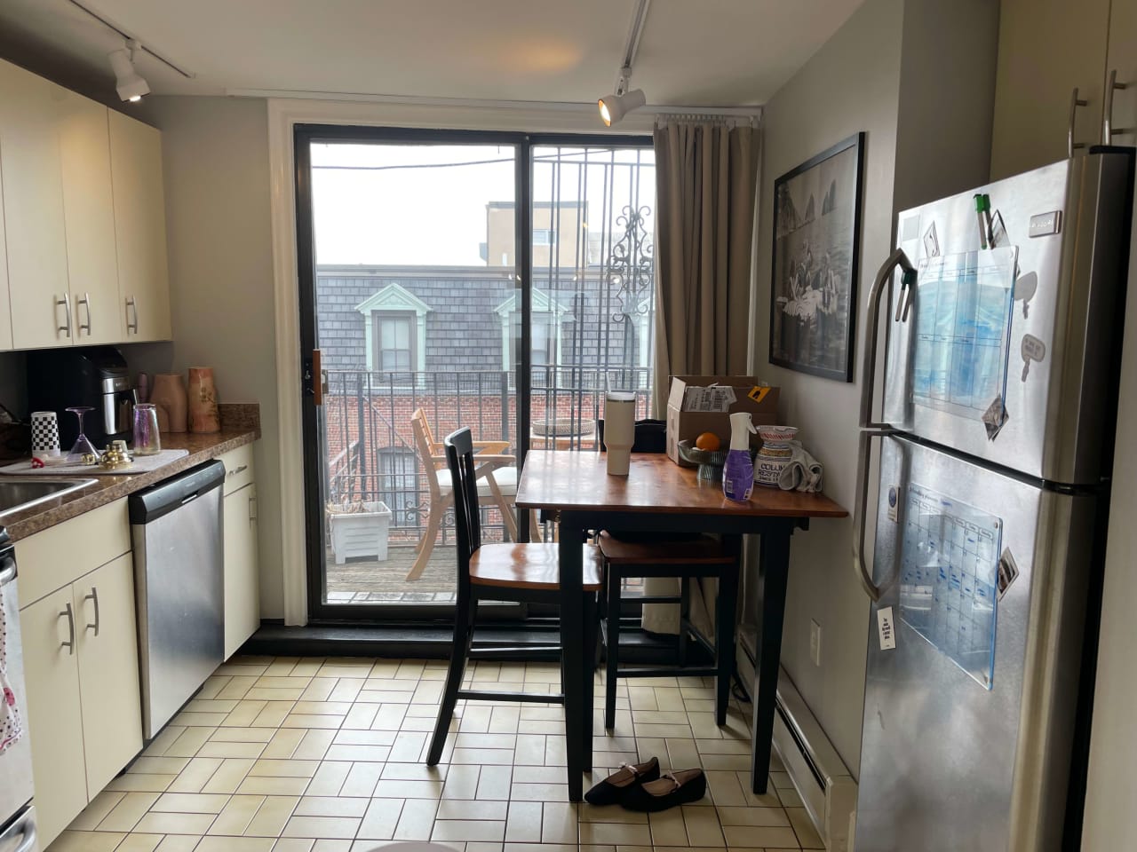 Unique Penthouse 1 bed w/ 2 Decks, exposed brick and laundry in unit! 