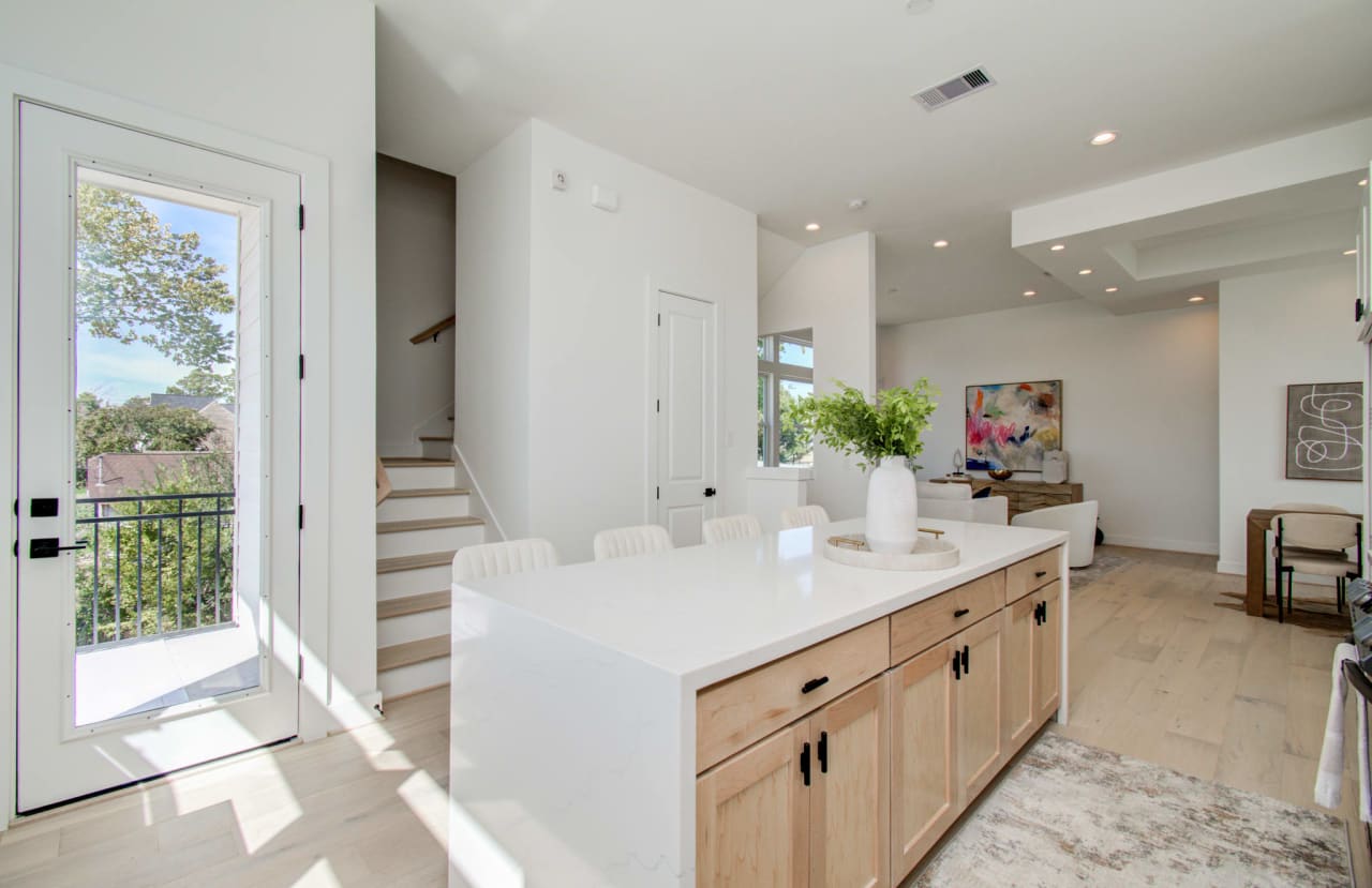 kitchen island with light wood cabinets