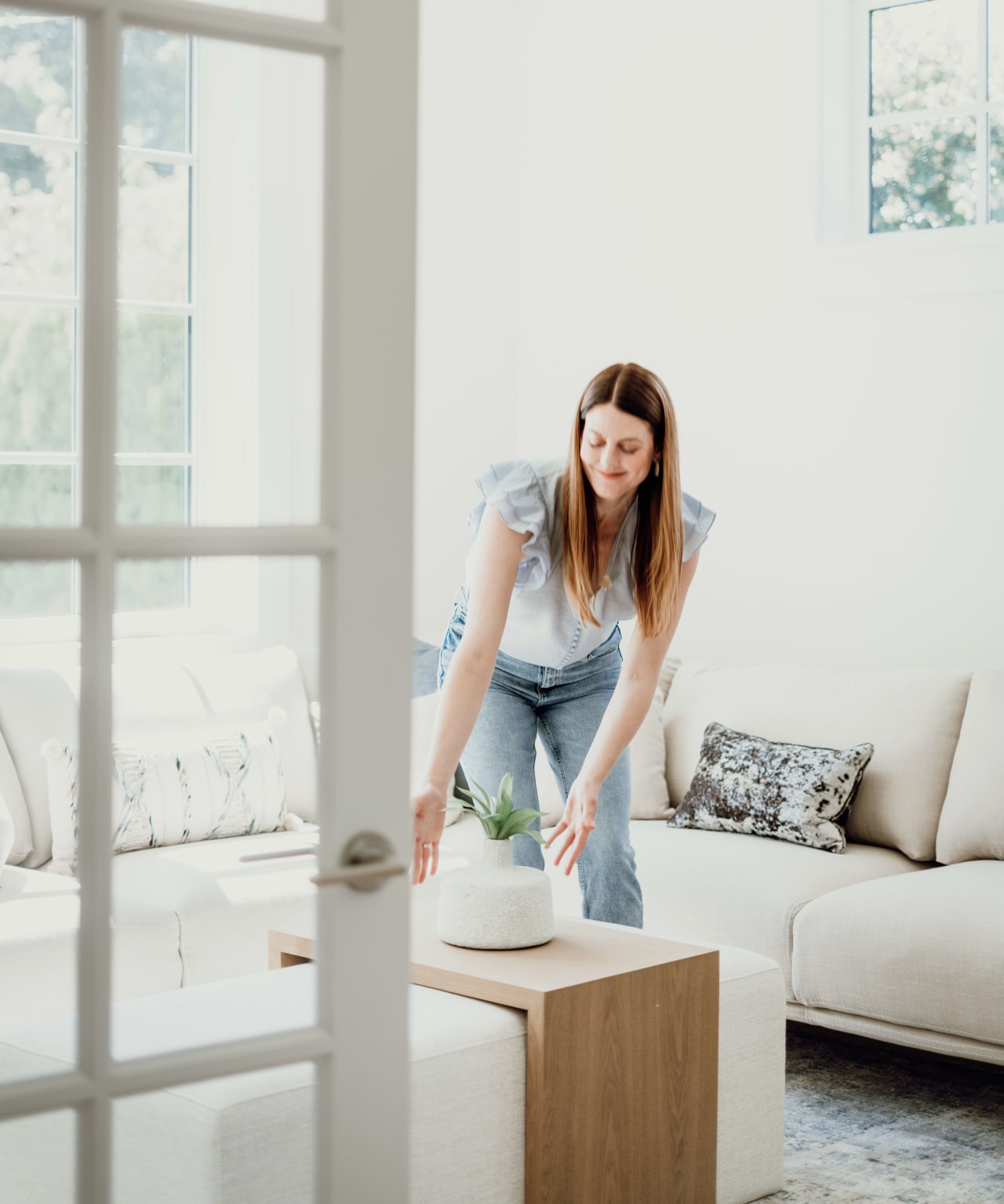 Real Estate Agent making final touches to a home for sale